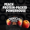 image:imageOikos Pro Peach YogurtCultured UltraFiltered Milk Product 20 Grams of Protein 0g Added Sugar Just Delicious High Protein Snacks 53 OZ Cup