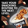 image:imageOikos REMIX Coco Almond Chocolate Coconut Nonfat Greek Yogurt with Honey Praline Almonds and Dark Chocolate MixIns Delicious High Protein Yogurt Snack With 11g of Protein 45 OZ Cup