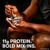 image:imageOikos REMIX Coco Almond Chocolate Coconut Nonfat Greek Yogurt with Honey Praline Almonds and Dark Chocolate MixIns Delicious High Protein Yogurt Snack With 11g of Protein 45 OZ Cup